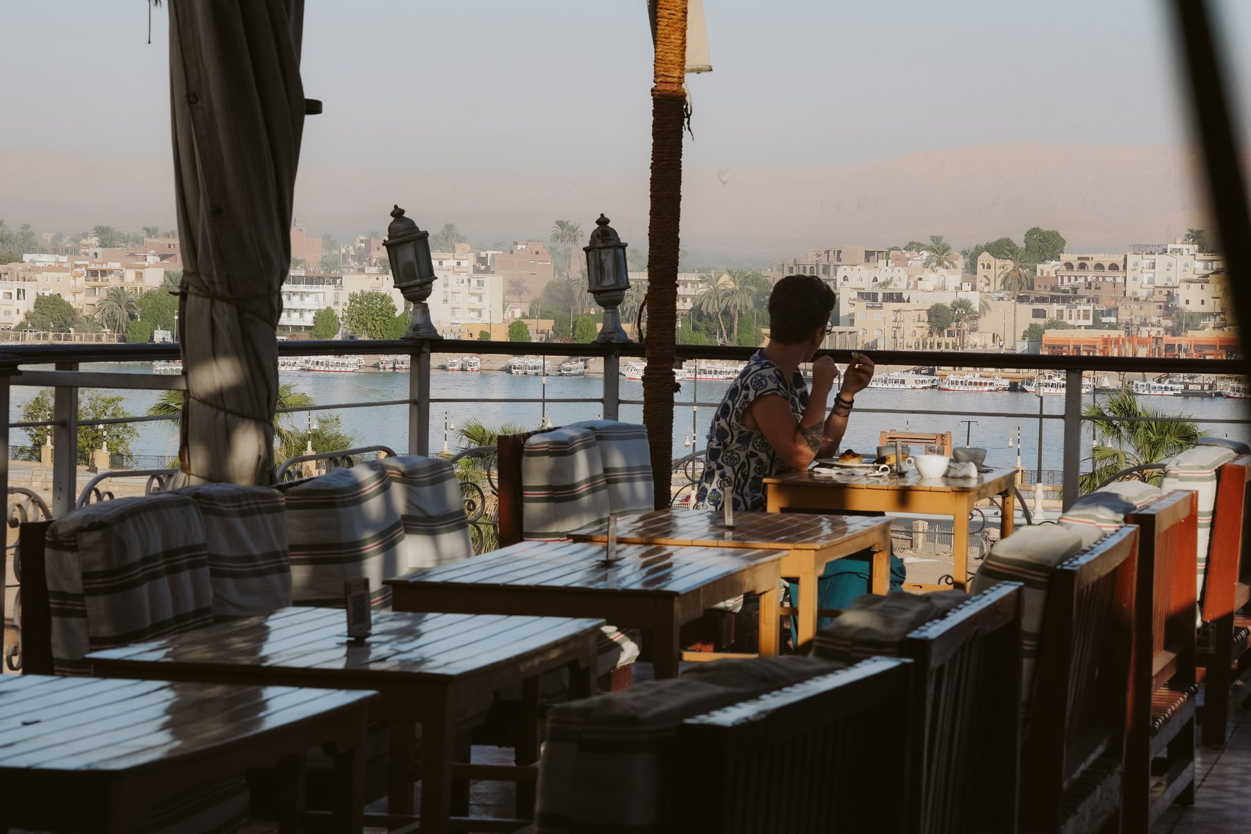 Dining on the Nefertiti rooftop terrace overlooking Luxor